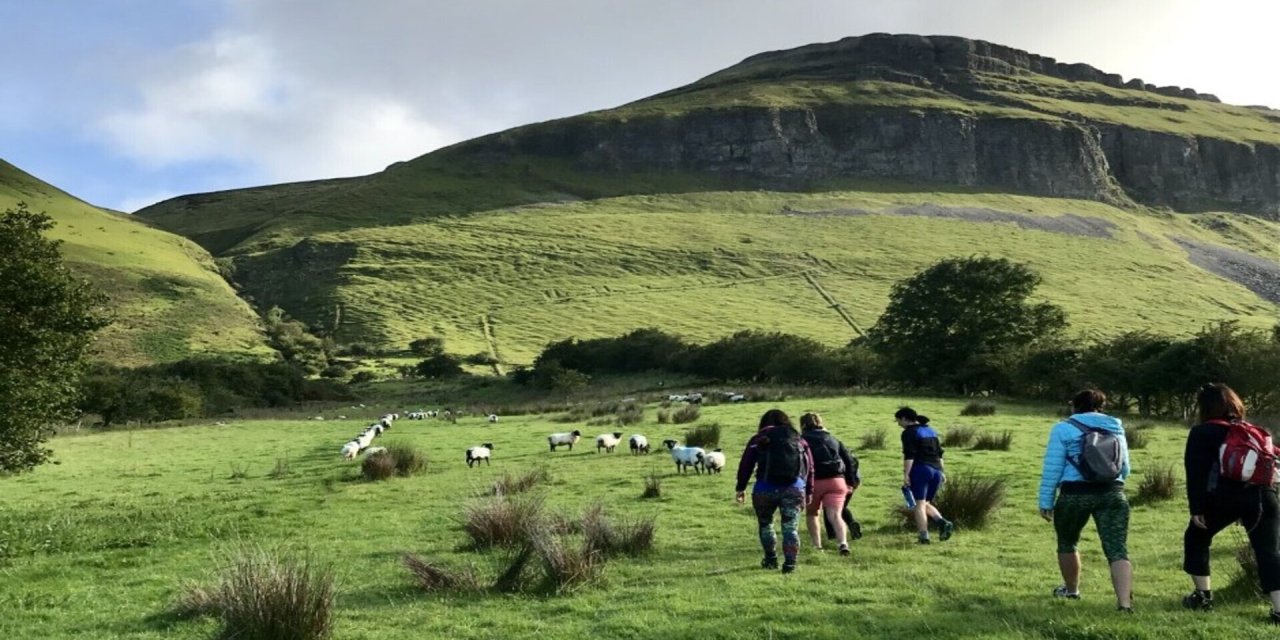 group making their way up the kings summit